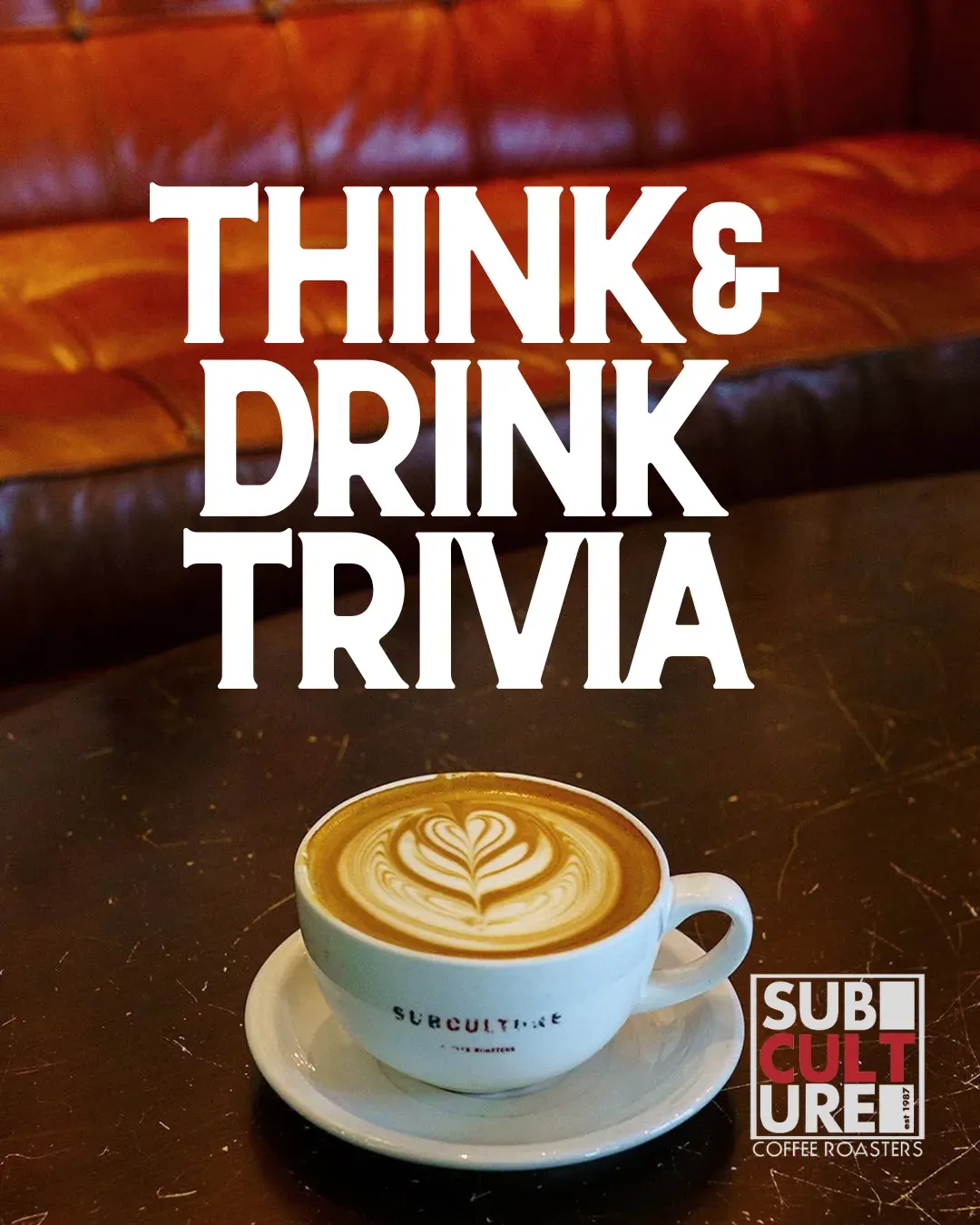 A group of people enjoying trivia night at a coffee shop.