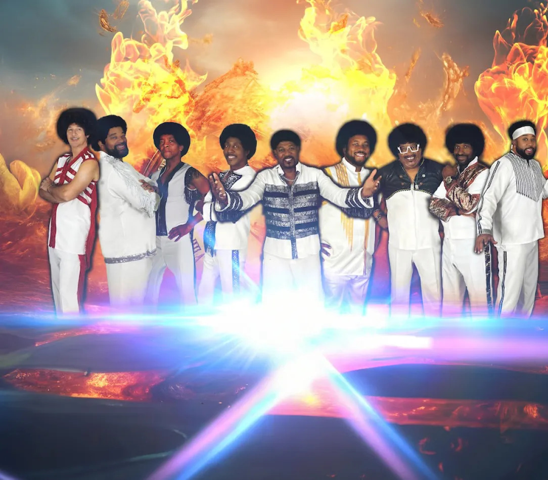 A live performance of Shining Star, a tribute to Earth, Wind & Fire, featuring musicians on stage.