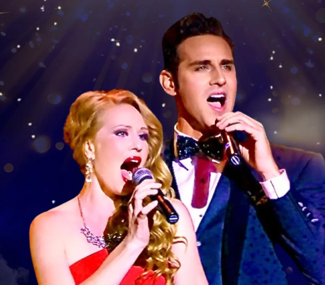 Performers on stage during a tribute to Andrew Lloyd Webber's music.