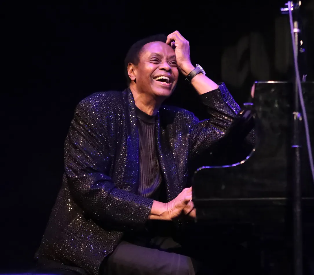 Copeland Davis performing on a piano at the Maltz Jupiter Theatre.